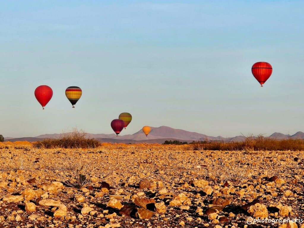 Ground View Splendor: Gazing Up at the Majesty of Hot Air Balloons