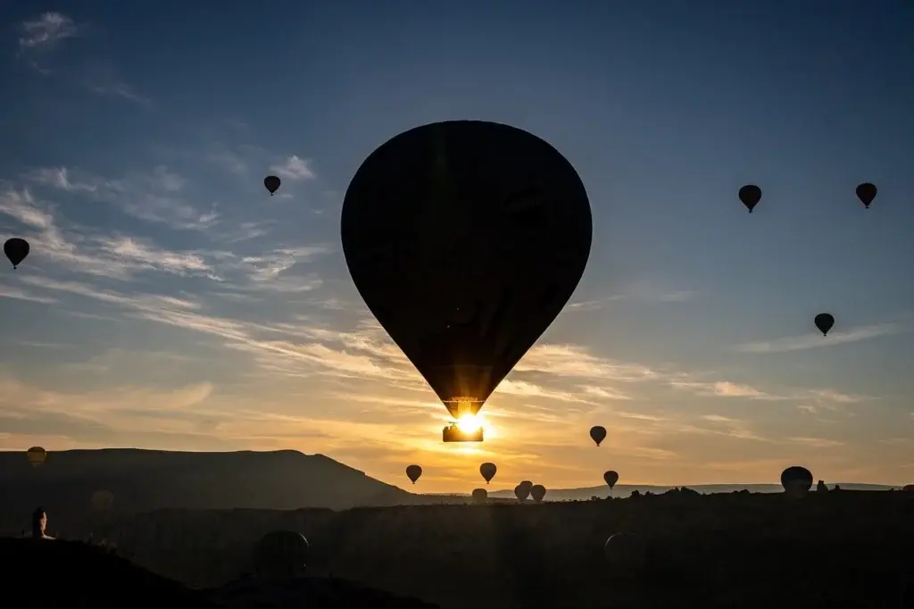 Hot air balloon taking a flight into the Moroccan sky.